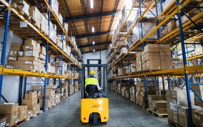 Warehouse man worker with forklift.